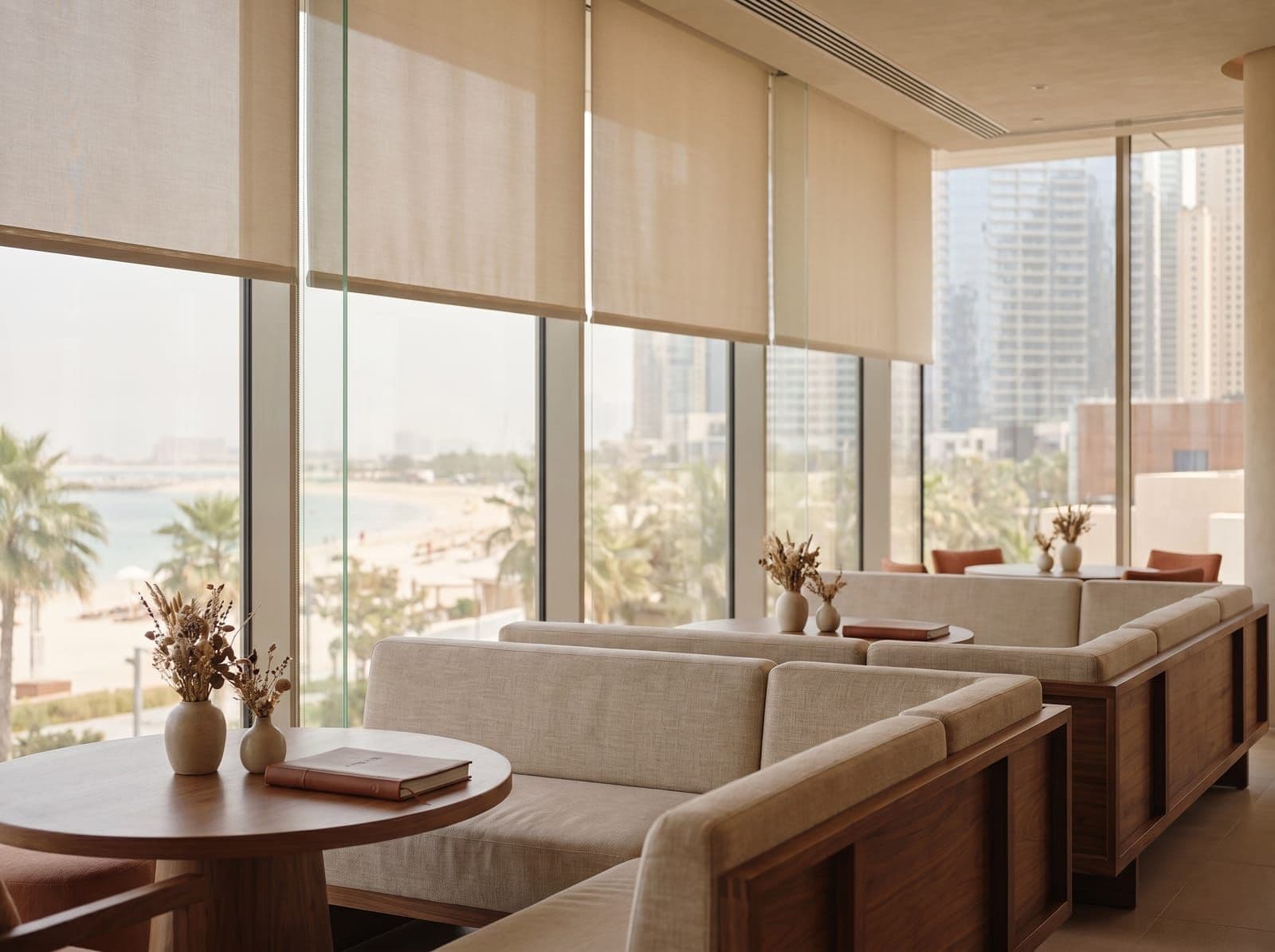 Lounge seating along the glazed partition